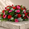 Recueillement Pourpre — coussin funéraire, fleurs de deuil livrées à Toulouse