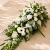 Blanc Éternel — dessus de cercueil funéraire, fleurs de deuil livrées à Toulouse